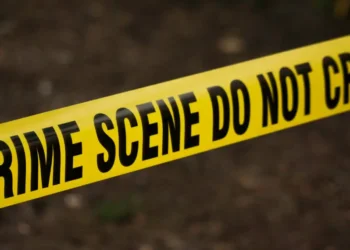 Yellow crime scene tape at location of Conway Gardens shooting in Castries, Saint Lucia