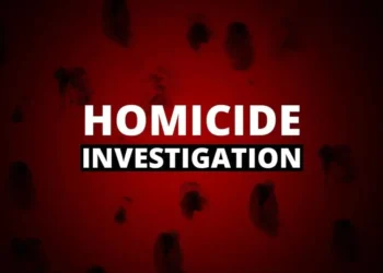 Saint Lucia Independence violence investigation graphic with red background and black fingerprints, symbolizing crime and homicide.