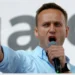 Alexei Navalny delivering a passionate speech, symbolizing his fearless fight against corruption before Alexei Navalny's death.