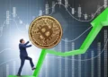 A businessman pushing a large Bitcoin symbol upward, symbolizing Bitcoin price trends 2024 with a rising green arrow and market chart in the background.