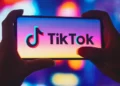 TikTok logo on a smartphone amid US TikTok ban debate. Credit: Rafael Henrique, Sopa Images, LightRocket, Getty Images.