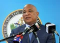Ernest Hiliare standing at the Podium during a pre-cabinet briefing addressing media on the Saint Lucia CBI Scandal
