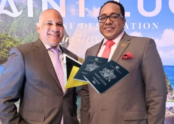 Saint Lucia Citizenship By Investment program highlighted with Ernest Hilaire and Thaddeus Antoine amidst corruption discussions, featuring Saint Lucian passports and a scenic island backdrop.