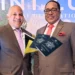 Saint Lucia Citizenship By Investment program highlighted with Ernest Hilaire and Thaddeus Antoine amidst corruption discussions, featuring Saint Lucian passports and a scenic island backdrop.