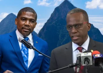 Philip J. Pierre and Dr. Terrance Drew at a Caribbean leadership summit, highlighting their contrasting responses to the CIP scandal, with Dr. Drew taking decisive action while Pierre's administration remains silent.