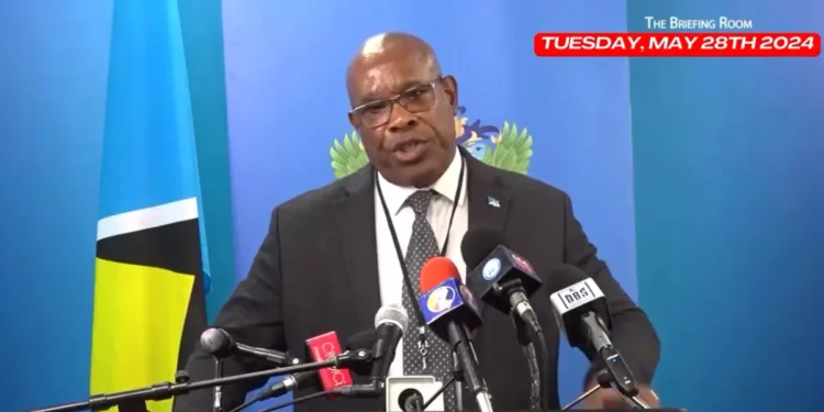 Richard Frederick addressing the media on the Castries vendors conflict, discussing his stance on the escalating Richard Frederick Castries Vendors Conflict.