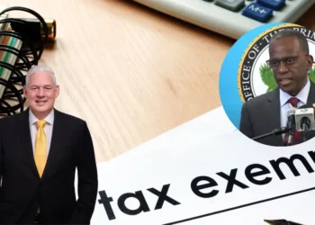 Allen Chastanet and Philip J Pierre with a tax exempt sign backdrop, highlighting the controversy over the Exemption of Health and Security Levy in Saint Lucia for a development in Rodney bay