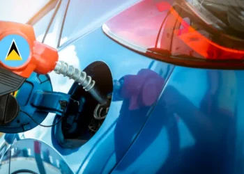 Car filling up its tank at a gas station, illustrating the latest Saint Lucia fuel prices adjustments