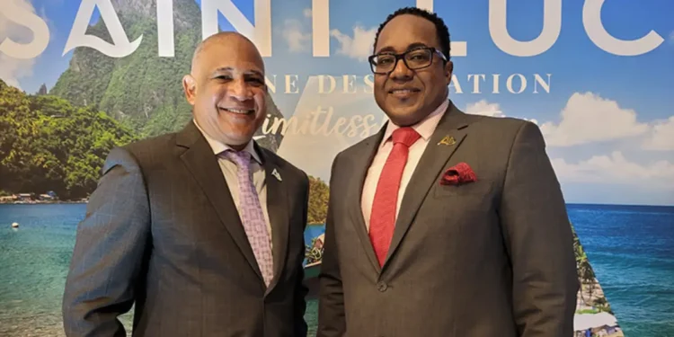 Ernest Hilaire and Thaddeus Antoine standing in front of the Soufriere Pitons, central figures in the Saint Lucia passport fraud scandal