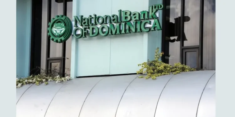 Front facade of the National Bank of Dominica building, illustrating the Caribbean bank crisis amid Citizenship by Investment program scrutiny and de-risking measures.