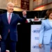 Joe Biden and Kamala Harris on stage during a campaign rally, discussing Biden 2024 re-election decision
