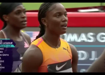 Julien Alfred anticipating her official time after crossing the finish line at the London Diamond League, where she set a new Julien Alfred 200m Record.
