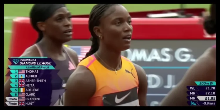 Julien Alfred anticipating her official time after crossing the finish line at the London Diamond League, where she set a new Julien Alfred 200m Record.