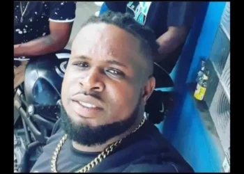 Kerdal Amedee in a blue shirt and huge gold chain, victim of Barre Denis homicide