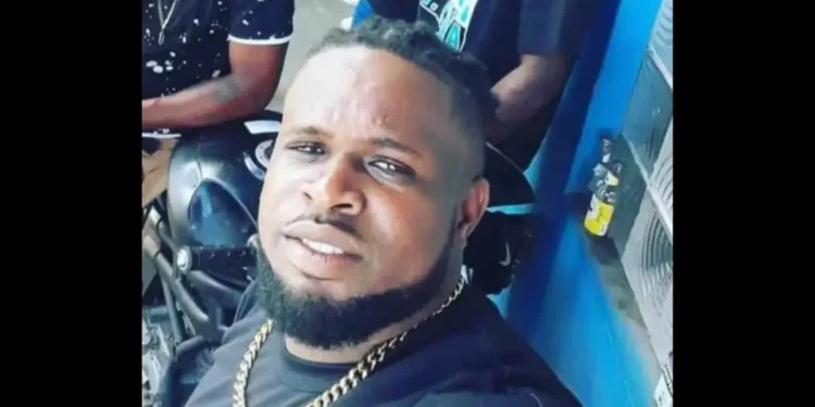 Kerdal Amedee in a blue shirt and huge gold chain, victim of Barre Denis homicide