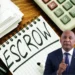 Notepad with the word 'escrow,' a marker, and a calculator representing the financial management involved in the Saint Lucia CIP scandal featuring Ernest Hilaire