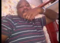 Retired Police Officer Terry Amedee, who allegedly committed suicide in Vieux Fort, seen laying down with his hand under his chin.