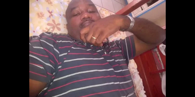 Retired Police Officer Terry Amedee, who allegedly committed suicide in Vieux Fort, seen laying down with his hand under his chin.