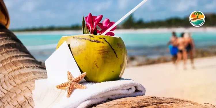 White sand beach with coconut and straw, starfish nearby, showcasing the serene setting and Caribbean tourism health tools initiative