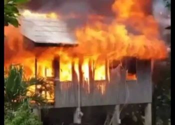 A house engulfed in flames during the Praslin Fire Tragedy, which claimed the life of a young child in the community of Praslin, Saint Lucia.