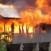 A house engulfed in flames during the Praslin Fire Tragedy, which claimed the life of a young child in the community of Praslin, Saint Lucia.