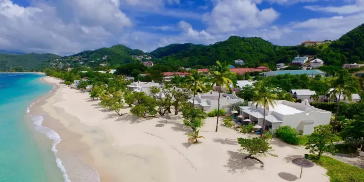 Aerial view of Grenada luxury resort Spice Island Beach, highlighting pristine white sand beaches and the resort's elegant property.