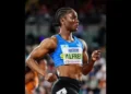 Julien Alfred Olympic Debut Saint Lucian sprinter Julien Alfred poised on the track during her impressive performance at the 2024 Paris Olympics.