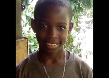 Photo of Melchizedek Tixcy wearing a brown t-shirt, the 13-year-old victim at the center of the tragic Melchizedek Tixcy Homicide