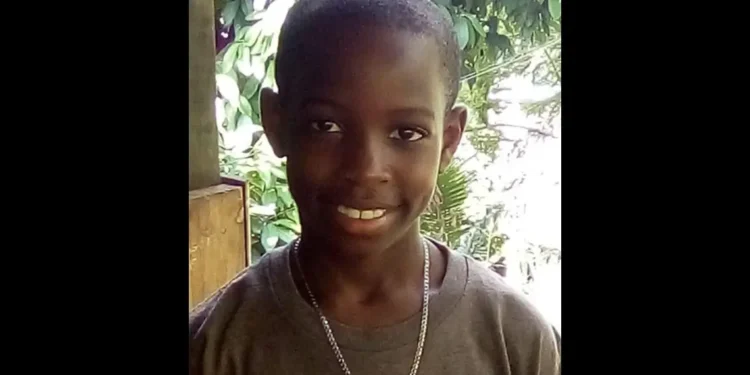 Photo of Melchizedek Tixcy wearing a brown t-shirt, the 13-year-old victim at the center of the tragic Melchizedek Tixcy Homicide