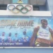 Billboard showcasing Julien Alfred in Saint Lucia, celebrating her historic Olympic wins, as part of the Julien Alfred Homecoming festivities