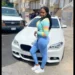 Christina Cephinis, the Saint Lucian woman at the center of a Brooklyn homicide investigation, posing in front of a white BMW.