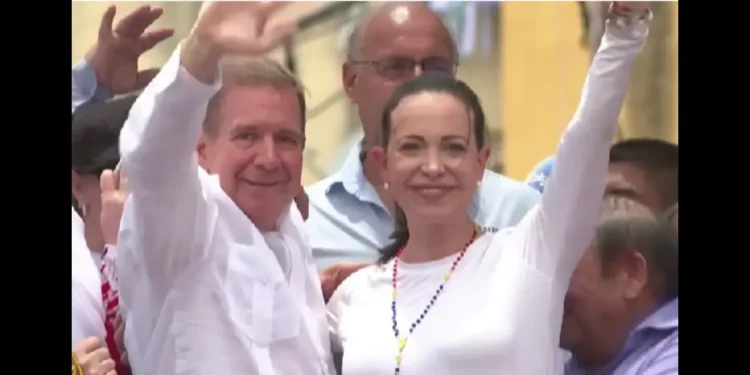 Edmundo González flees Venezuela, seen waving at the crowd alongside his wife during a public appearance before his escape.