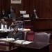 Ernest Hilaire stands in Parliament with Leslie Mondesir and Philip J Pierre amid growing scrutiny in the Saint Lucia citizenship scandal.