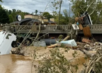 Flooding in Biltmore Village during Hurricane Helene recovery efforts, with streets submerged under water. Photo credit: Dan Whittaker.