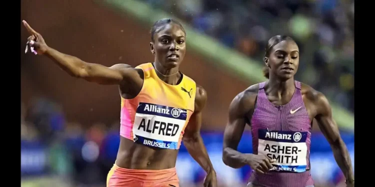 Julien Alfred crossing the finish line to win the 100m at the Julien Alfred Diamond League 2024, with Dina Asher-Smith finishing in close second.