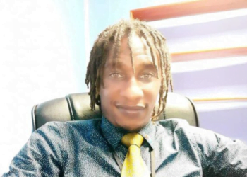 Miguel Fevrier sitting in his office, central figure in the Saint Lucia government corruption scandal.