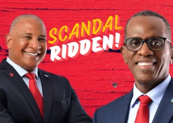 Philip J. Pierre and Ernest Hilaire smiling amid the ongoing Ernest Hilaire Political Scandal, raising questions about accountability in Saint Lucia.