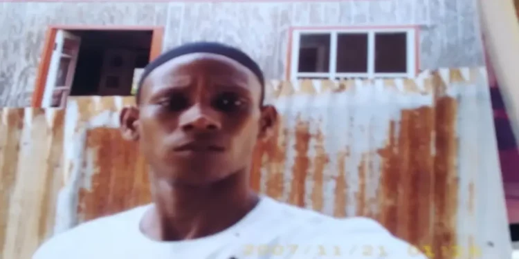 Kervin Louis in a white shirt and black head covering before the fatal chopping in Bacadere, Vieux-Fort. Photo credit: Loop St. Lucia.