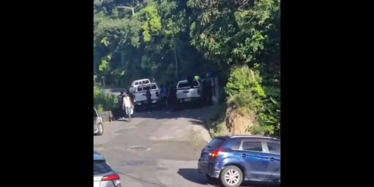 Police at the scene of Bagatelle police shooting, showing officers investigating after fatal confrontation.