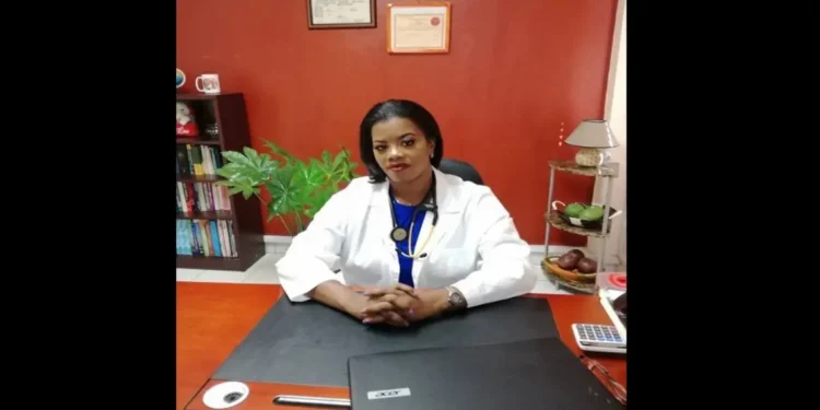 Resignation of Dr Merle Clarke: Dr. Merle Clarke in a lab coat sitting at her desk, reflecting on Saint Lucia’s healthcare challenges