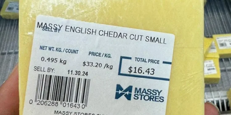 Image of a $16.43 block of English cheddar cheese from Massy Stores, highlighting Saint Lucia cheese prices amid cost of living concerns.