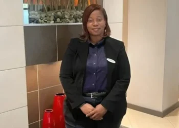 Phyllis Hodge, St. Kitts-Nevis native and newly appointed Assistant General Manager at Hyatt Place Atlanta, posing in the hotel lobby