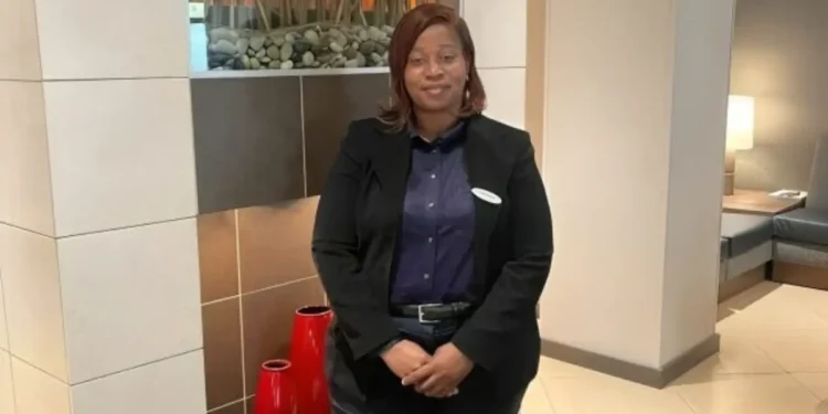 Phyllis Hodge, St. Kitts-Nevis native and newly appointed Assistant General Manager at Hyatt Place Atlanta, posing in the hotel lobby