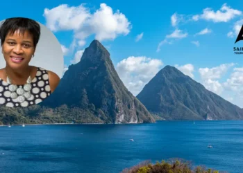 Portrait of Lorine Charles-St Jules, with the iconic Saint Lucia Pitons in the background. SLTA bids farewell to its inspiring former CEO.
