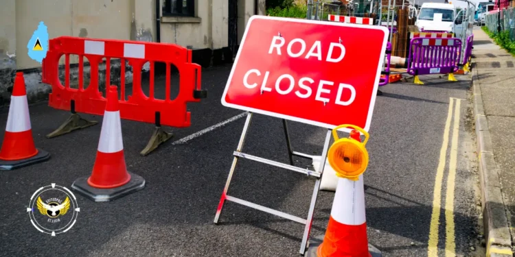 Road closed sign and barriers at a construction site, highlighting ongoing St Lucia roadworks and temporary traffic adjustments.
