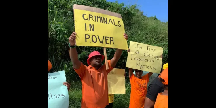 UWP supporters holding protest signs during the delivery of the UWP scathing letter to Pierre, calling out CIP mismanagement and leadership failures.