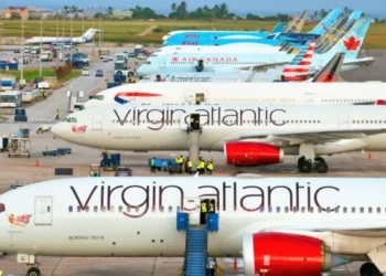 Airplanes on the tarmac during the Barbados airport milestone at Grantley Adams International Airport.