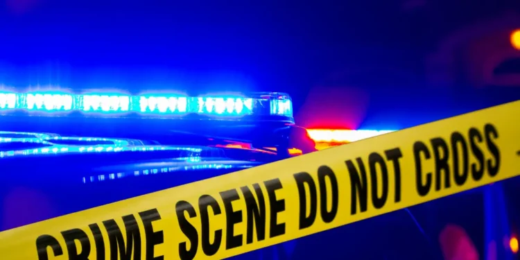 Belair Robbery Victim Dies Crime scene tape with police lights in the background, symbolizing the investigation into the Belair robbery victim's death in Saint Lucia.