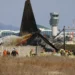 Image showing the wreckage of the Jeju Air crash at Muan International Airport in South Korea, with emergency responders on-site. Credit AP News