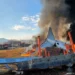 Jeju Air Boeing 737-800 engulfed in flames after the South Korea plane crash at Muan International Airport, with emergency crews on-site.
